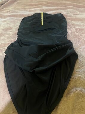 Calvin Klein Black Garment with Gold Logo Tag